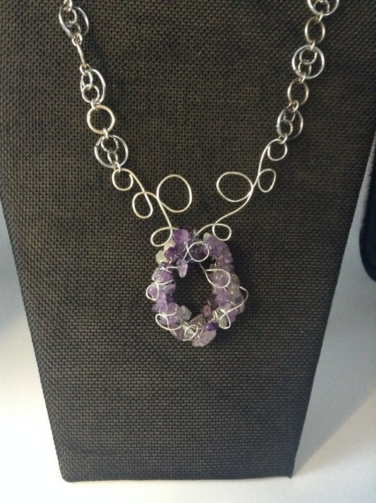 Mulyiple Amethyst Chips Create a Unique Pendent of Lovely Shades of Purple